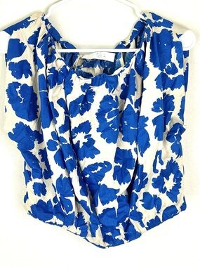 TELA blue floral puffy sleeveless blouse size medium
